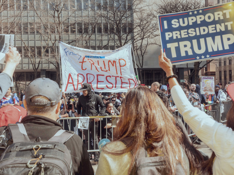Supporters of former President Donald Trump and protestors during a rally outside criminal court in New York, US, on Tuesday, April 4, 2023. 