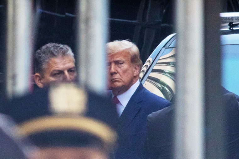 Former President Donald Trump arrives at court for his arraignment on Tuesday.