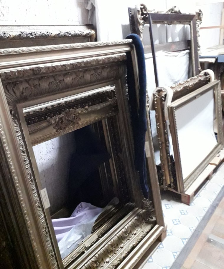 Russian forces left behind empty picture frames after hauling away paintings from Kherson Regional Art Museum. 