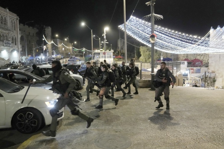 Israeli Border Police are deployed near the Damascus Gate to the Old City of Jerusalem during a raid by police at the Al-Aqsa Mosque compound, Wednesday, April 5, 2023. 