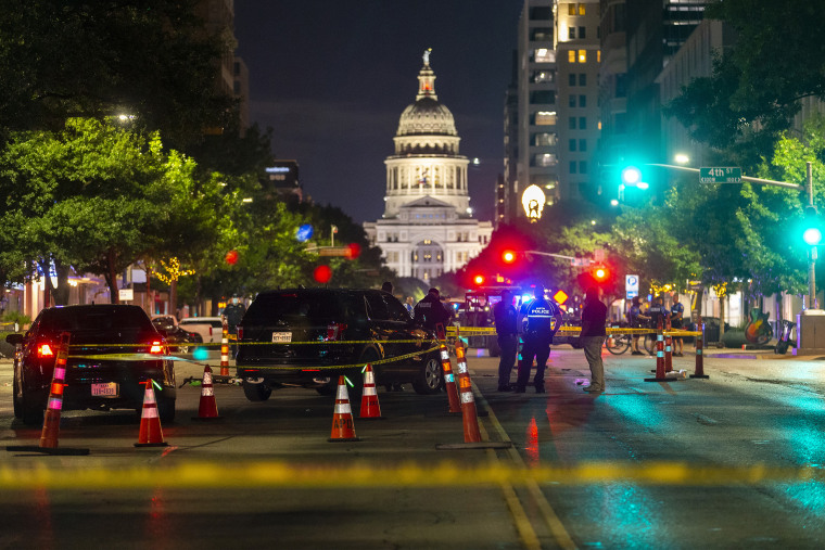 Austin police investigate a homicide shooting which occurred at a demonstration against police violence in downtown Austin, on July 25, 2020.
