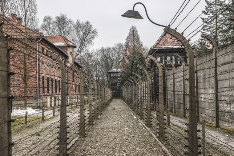 Barb wired fence in the former Nazi German Auschwitz concentration camp.