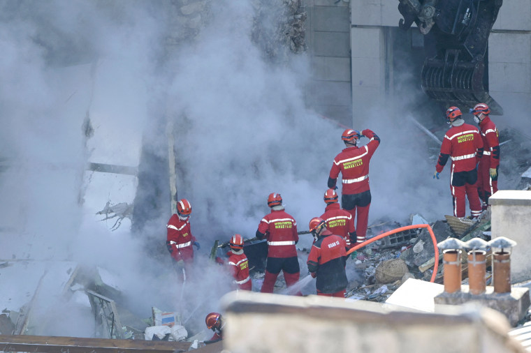 Firefighters respond to a collapsed building in Marseille, France, on April 9, 2023.