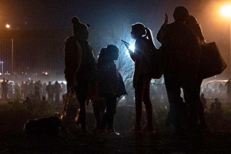 Migrants wait at the border in Ciudad Juarez, Mexico