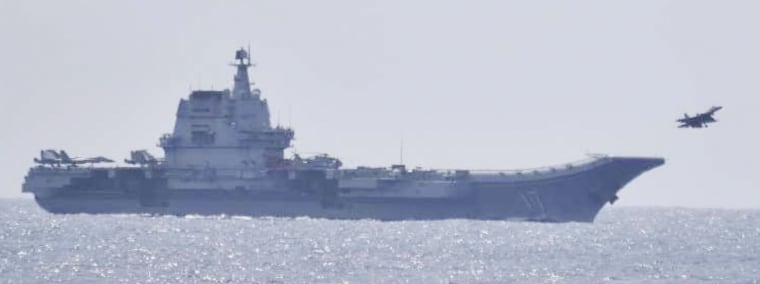 A fighter plane takes off from the Chinese aircraft carrier Shandong in the Pacific Ocean south of Japan's Okinawa prefecture on April 9, 2023.