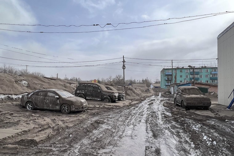 This handout photo released by the Head of the Ust-Kamchatsky municipal district Oleg Bondarenko on Tuesday, April 11, 2023, shows volcanic ash covering the ground in Ust-Kamchatsky district after the Shiveluch volcano's eruption on the Kamchatka Peninsula in Russian far east. Shiveluch, one of Russia's most active volcanoes, erupted Tuesday, spewing clouds of ash 20 kilometers into the sky and covering broad areas with ash.