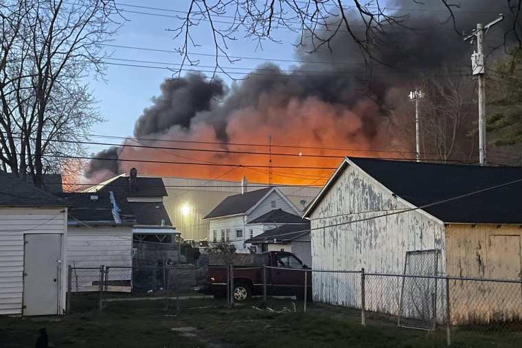 Smoke billows from a former factory site in Richmond, Indiana on April 11, 2023.