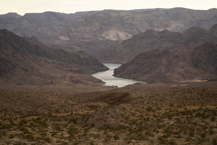 Water flows down the Colorado River in Ariz, on Aug. 14