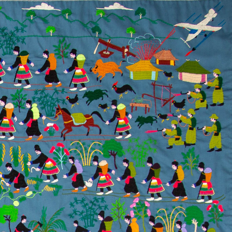 In this Hmong story cloth, a plane douses villages with chemical agents as some villagers cross the Mekong River to become refugees in Thailand.