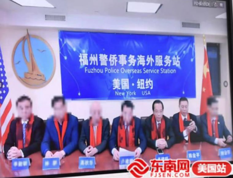 The FPSSOC Principals in the picture include, among
others, the defendants Lu Jianwang and Chen Jinping, unblurred, sit with five others associated with the FPOSS.