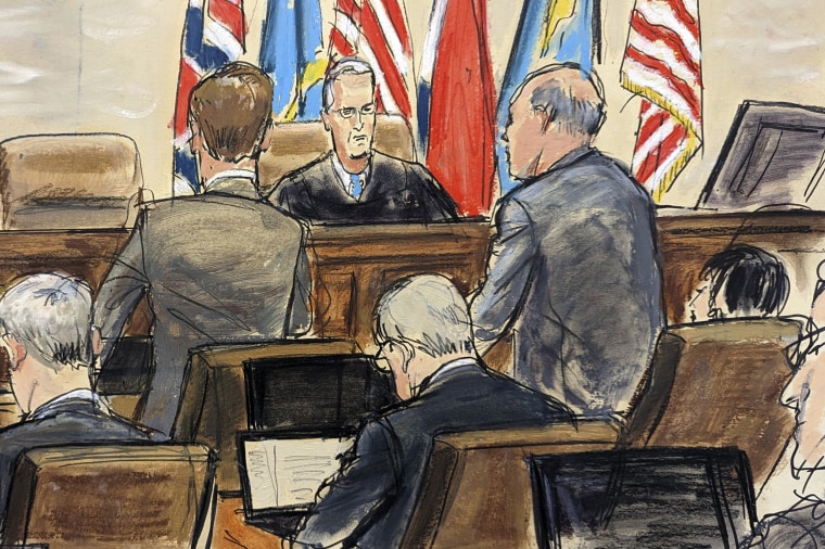 courtroom sketch: Dominion Voting Systems attorney Justin Nelson, standing left, and Fox News attorney Daniel Webb, standing at right, speak to Judge Eric Davis before finishing jury selection in Delaware Superior Court on April 18, 2023, in Wilmington, Del.