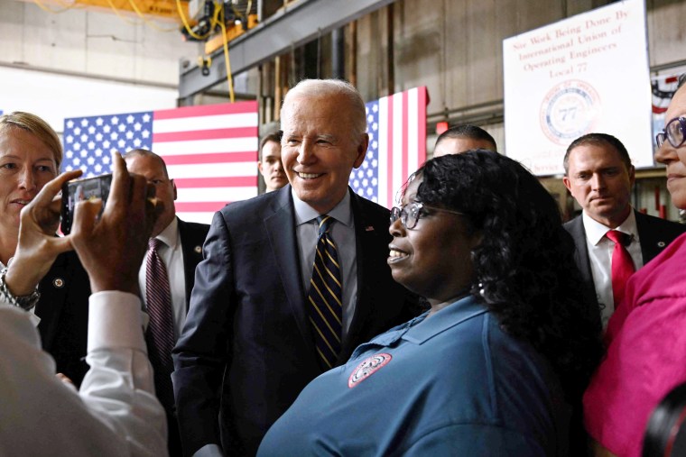 President Joe Biden greets attendees at the International Union of Operating Engineers Local 77 facility in Accokeek, Md.