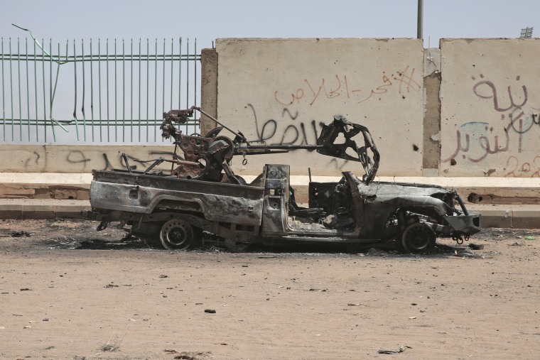 A destroyed military vehicle in Khartoum, Sudan, on April 20, 2023.