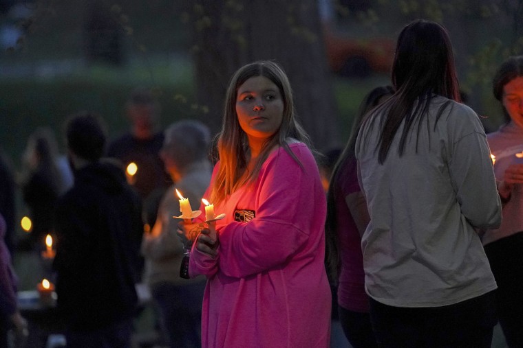 Friends and family attend a candlelight vigil for Kaylin Gillis at Fort Hardy Park in Schuylerville, N.Y., on April 20, 2023. Gillis died when a homeowner fired into the car she was traveling in. 