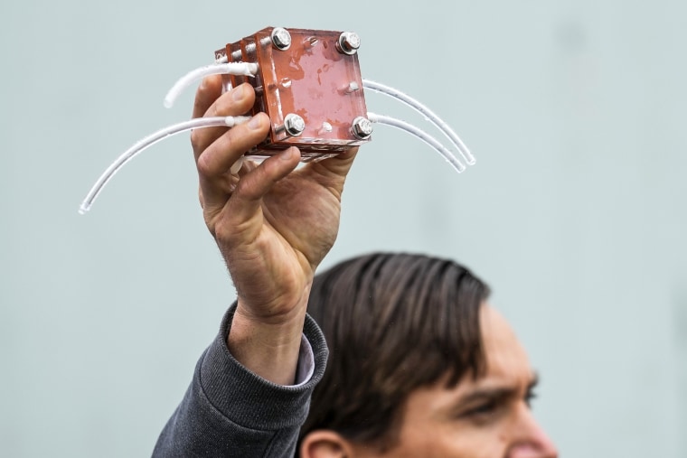 Image: Dante Simonetti, associate professor and vice chair for undergraduate education at the UCLA Samueli Chemical and Biomolecular Engineering Department, explains a technology dubbed SeaChange during a news conference, on April 12, 2023, in San Pedro, Calif. 