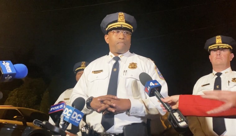 Assistant Chief Andre Wright speaks to reporters about a shooting in Washington, D.C.