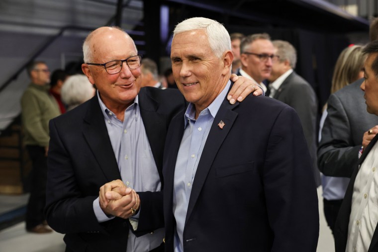 Former Vice President Mike Pence greets guests at the Iowa Faith & Freedom Coalition Spring Kick-Off on April 22, 2023, in Clive, Iowa.