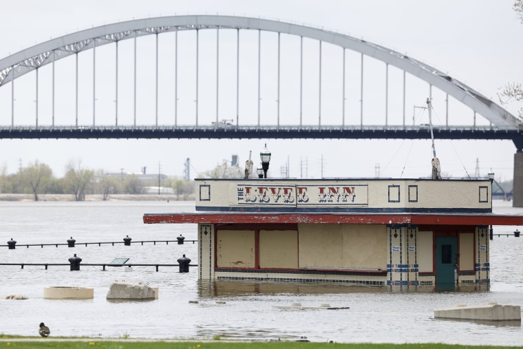 The Levee Inn is partially submerged by the rising Mississippi River, Monday, April 24, 2023, Davenport, Iowa.
