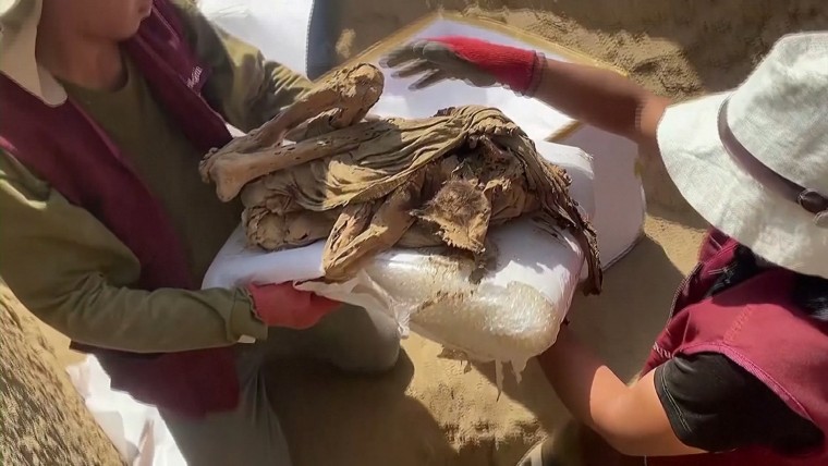 Peruvian archaeologists unearthed a more than 1,000-year-old mummy on the outskirts of the modern capital on April 24, in the latest discovery dating back to pre-Inca times.