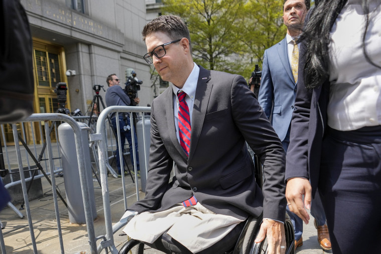 Brian Kolfage leaves court in New York on April 26, 2023, after being sentenced for defrauding donors in the "We Build the Wall" effort.