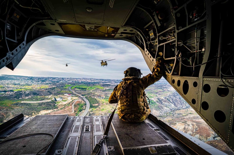 A CH-47 Chinook flight engineer during a training session over Cyprus in 2020.