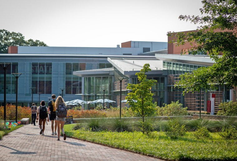 Students walk past the Tolley Student Center at North Carolina State University in Raleigh in 2021. 