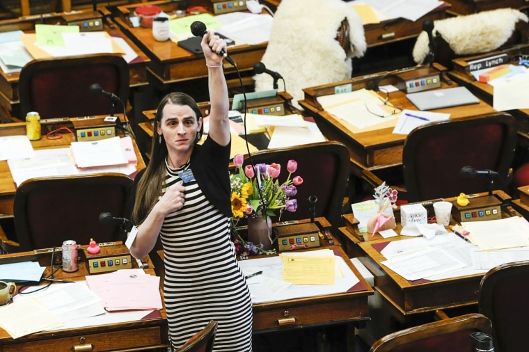 Rep. Zooey Zephyr, D-Missoula, alone on the house floor stands in protest as demonstrators are arrested in the house gallery on Monday, April 24, 2023 in the Montana State Capitol.