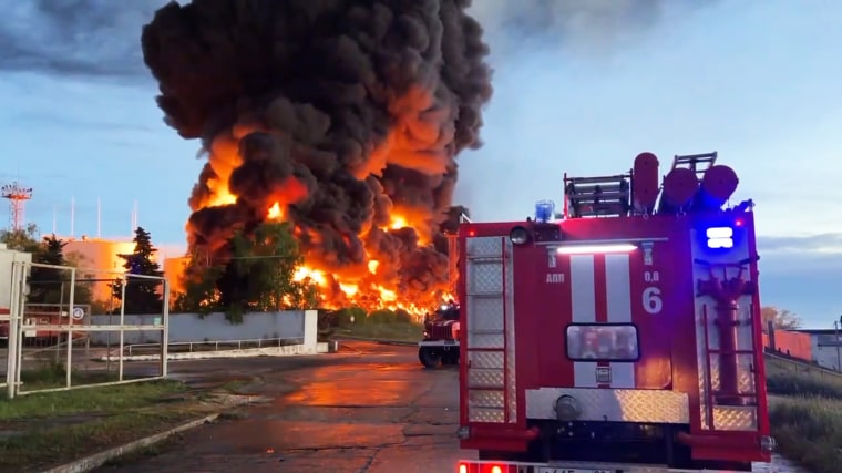 Fire burns from fuel tank after being hit by a drone in Sevastopol, Crimea