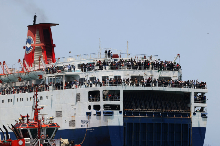 A ferry transports approximately 1,900 evacuees from Port Sudan to the King Faisal of Saudi Arabia's naval base in Jeddah, Saudi Arabia.