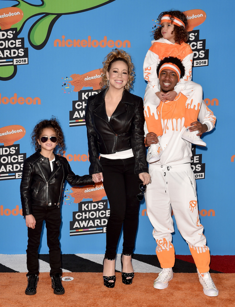 Mariah Carey, Nick Cannon, daughter Monroe Cannon and son Moroccan Cannon attend Nickelodeon's 2018 Kids' Choice Awards at The Forum on March 24, 2018 in Inglewood, California. 