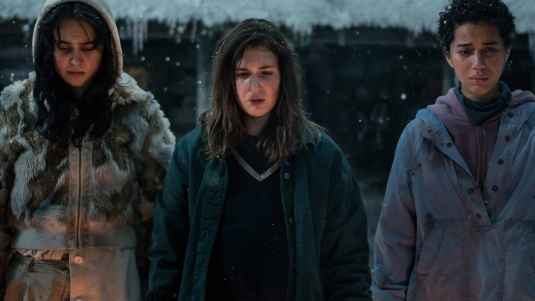 Things get gnarly in Season Two of "Yellowjackets." Pictured (l-r): Courtney Eaton, Sophie Nelisse, Jasmin Savoy Brown.
