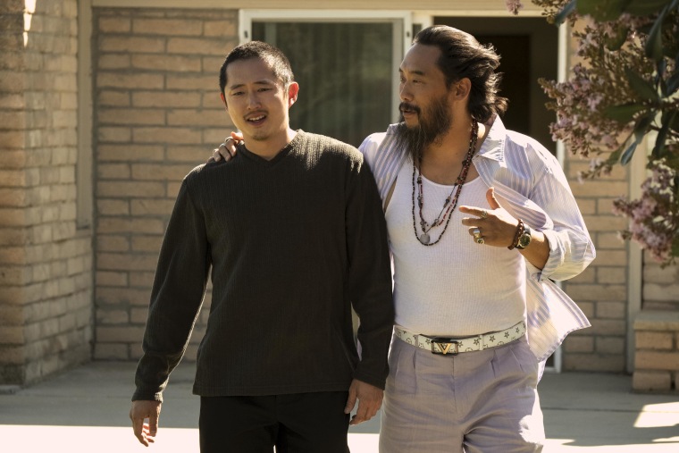 Steven Yeun as Danny, David Choe as Isaac in episode 106 of Beef. 