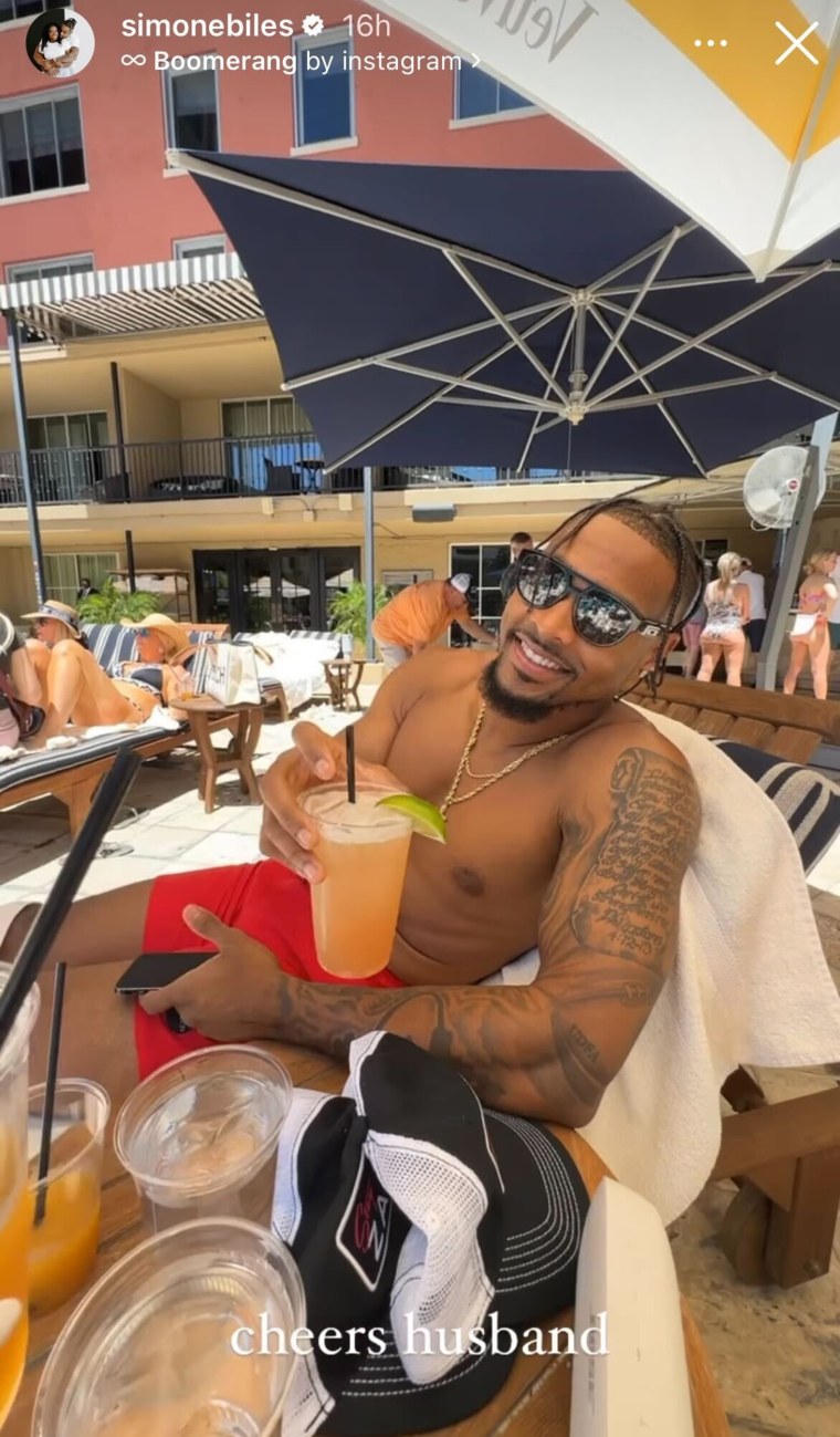 Biles and Owens enjoying some poolside drinks after their ceremony.