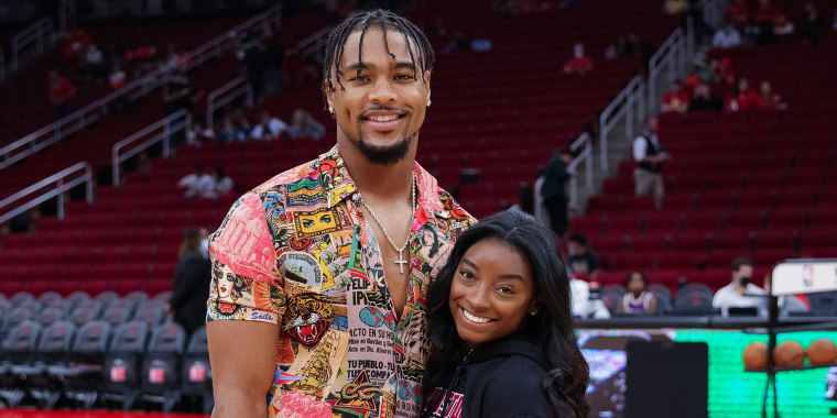 Simone Biles and Jonathan Owens attend a game between the Houston Rockets and the Los Angeles Lakers at Toyota Center on December 28, 2021 in Houston, Texas.