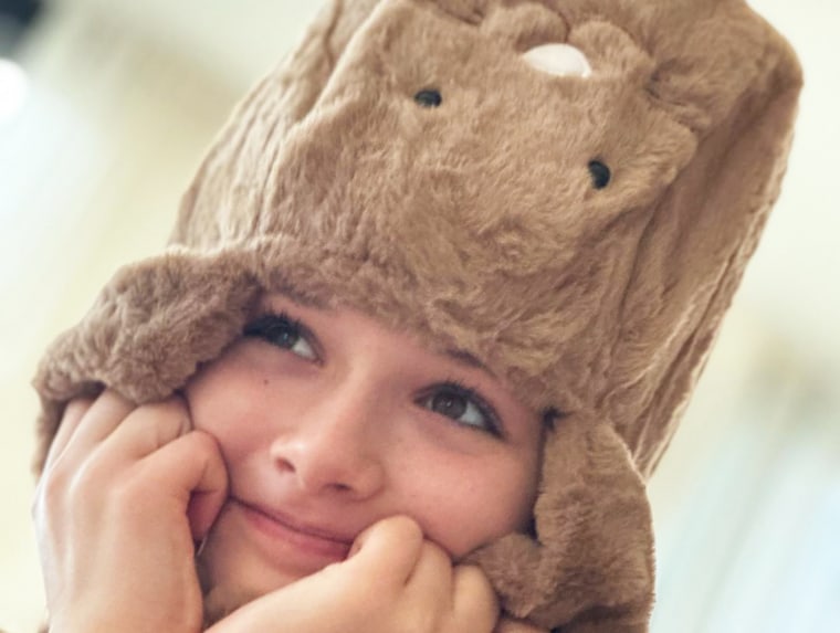 Harper Beckham posed in a bunny hat.