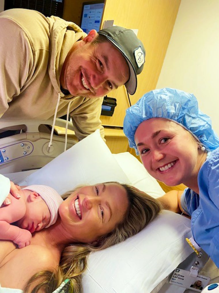 AuBree and Allie LaForce with her husband Joe and their newborn baby.