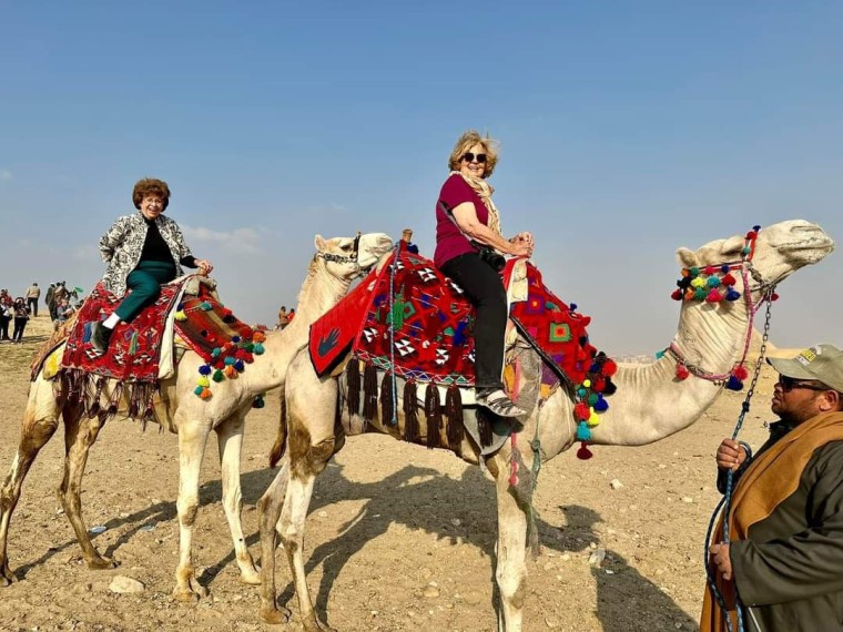 Hamby and Hazelip on camels.