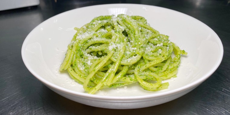 This green noodle recipe features a spin on pesto that uses baby spinach instead of basil.