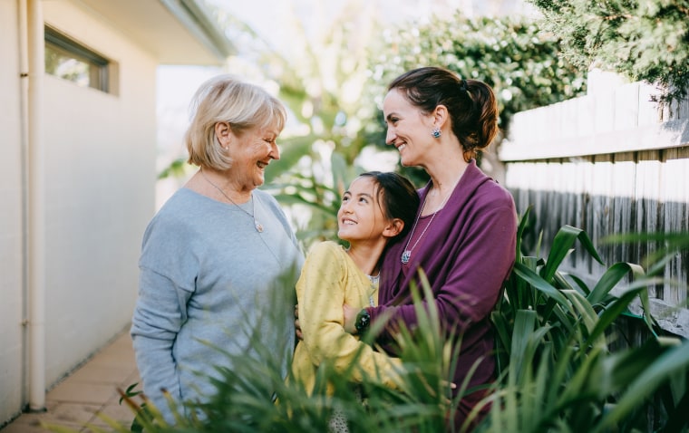 Cheerful three generation family. Grandmother, mother, and daughter.