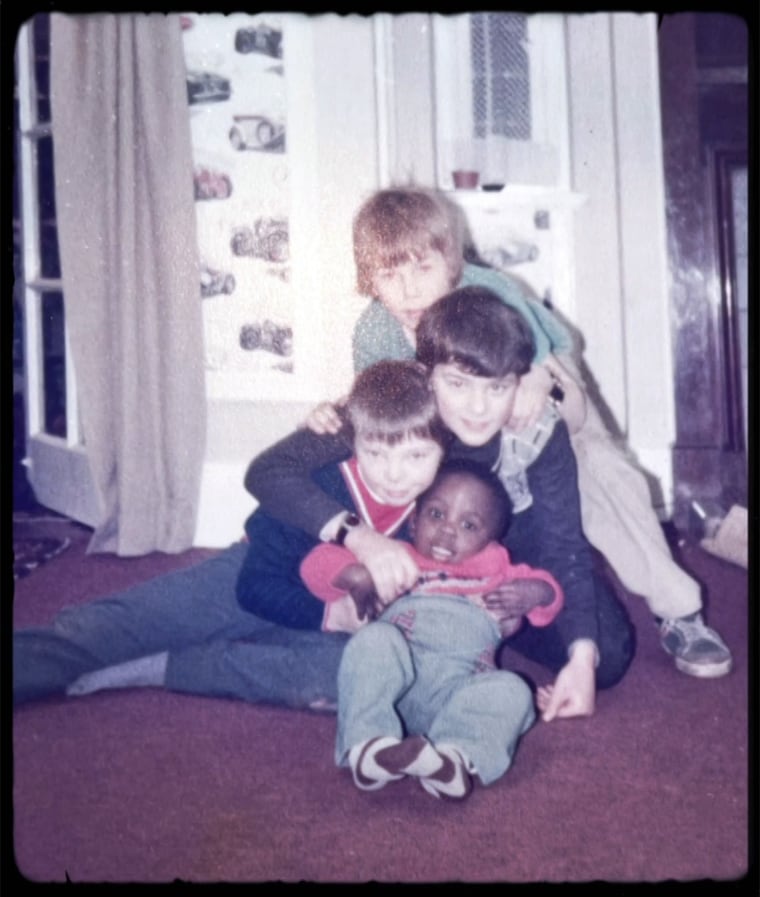 Jimmy Akingbola with his adoptive family.