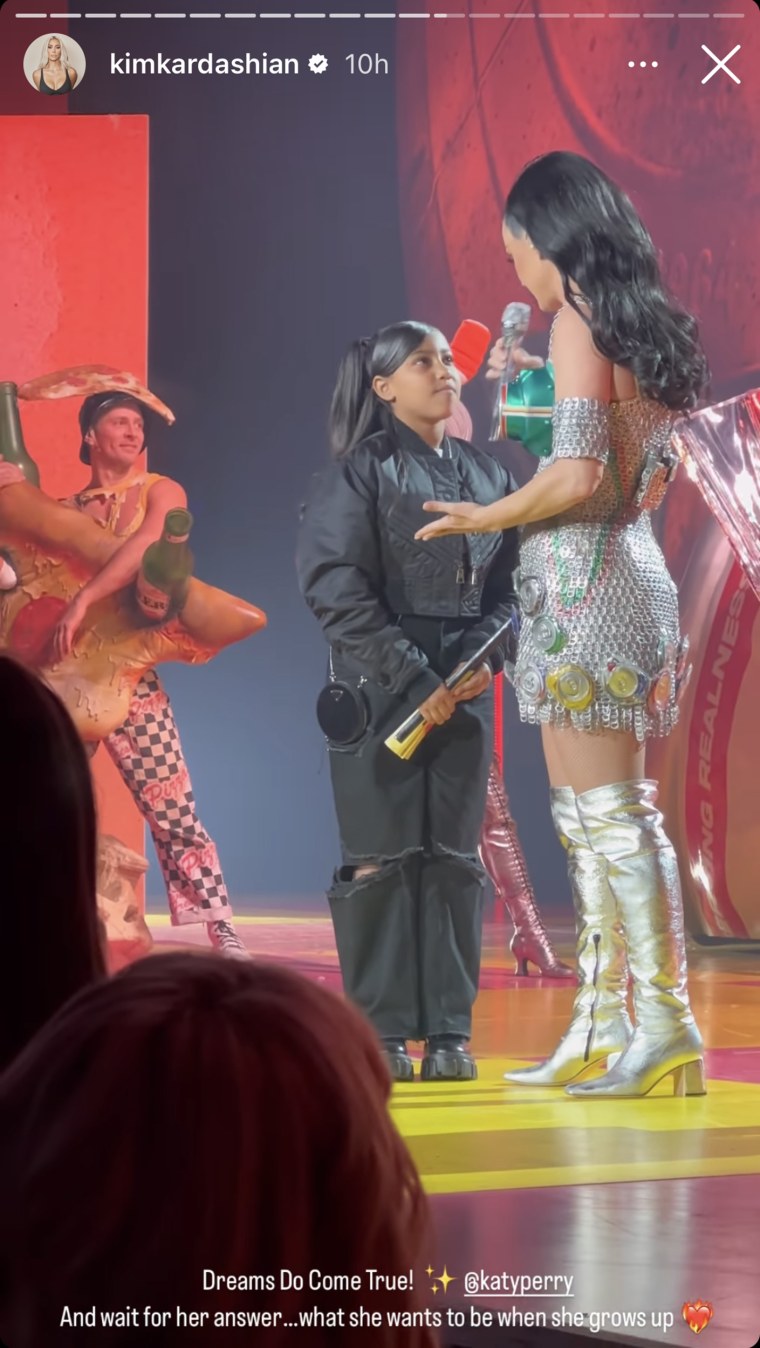 Katy Perry interviews North West onstage.