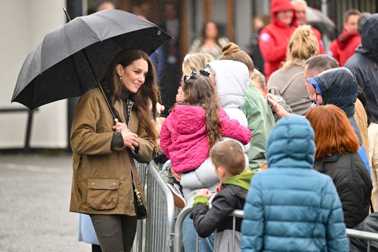 The Princess of Wales speaking with people outside Dowlais Rugby Club during a 2 day visit to Wales on April 27, 2023.