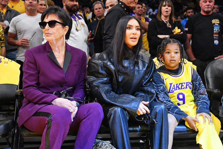 Kris Jenner, Kim Kardashian and Saint West at a basketball game between the Los Angeles Lakers and the Memphis Grizzlies.