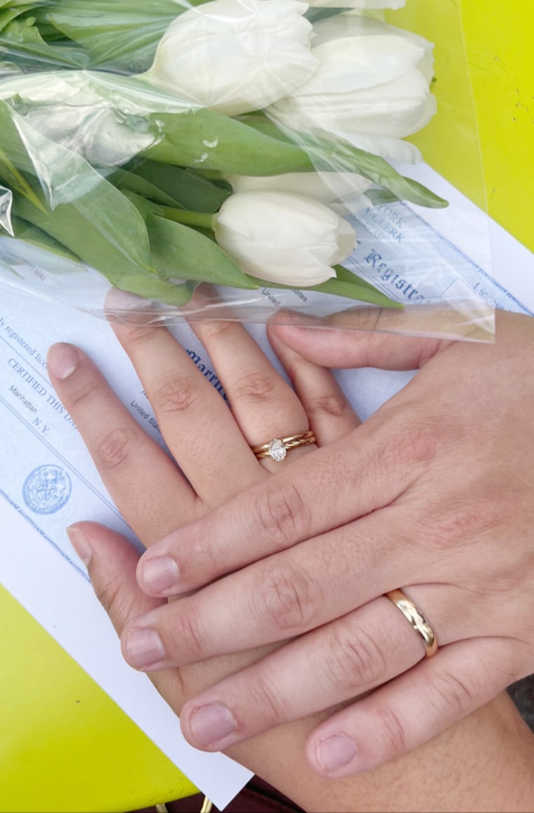 The couple's rings, marriage certificate and flowers. "It was our day, and it was perfect," he says.