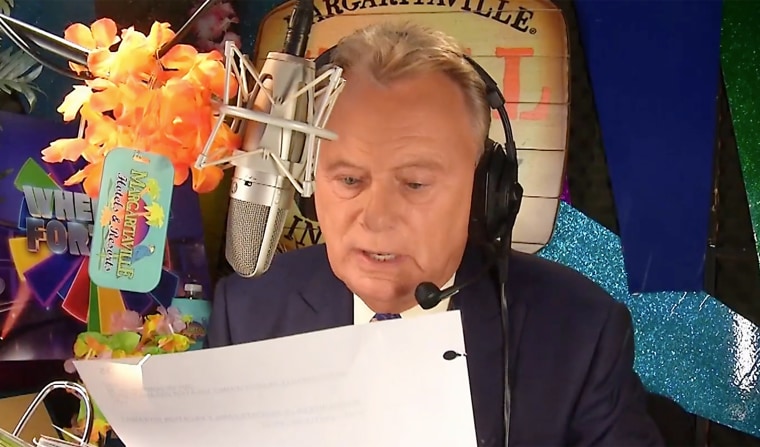 Is there anything Pat Sajak can't do? Here, he exchanges roles with announcer Jim Thornton.