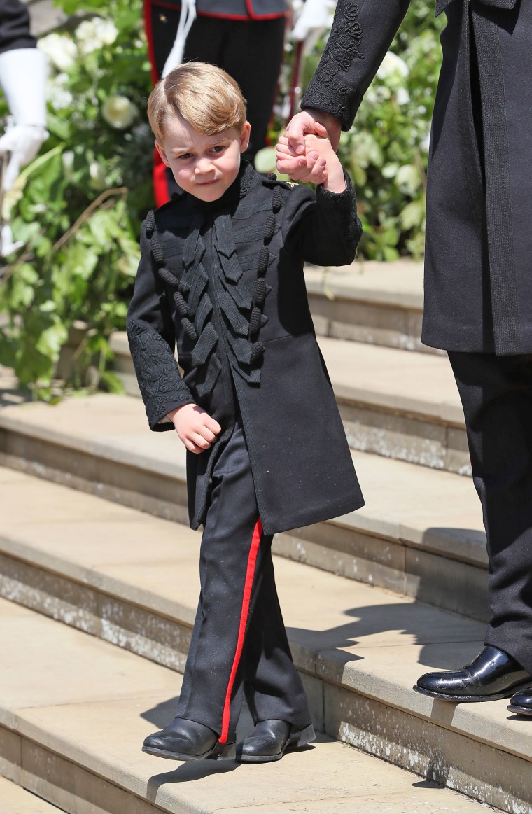 Prince George leaves St George's Chapel after the wedding of Prince Harry, Duke of Sussex and Meghan Markle on May 19, 2018 in Windsor, England.