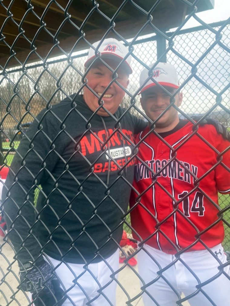 Jim Fullan, 56-year-old baseball player, poses with teammate