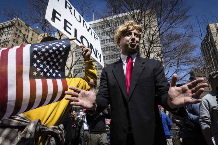 A Donald Trump impersonator appears at a protest held in Collect Pond Park on April 4, 2023, across the street from the Manhattan District Attorney's office in New York.
