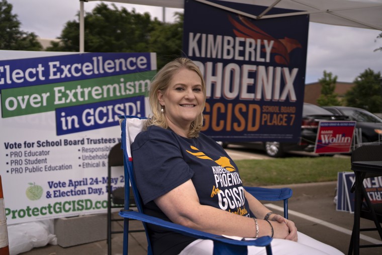 Image: GCISD school board candidate Kimberly Phoenix outside a voting location at the Grapevine Library in Texas on Saturday.