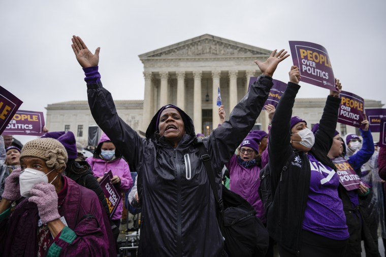 Members of the League of Women Voters rally outside the U.S. Supreme Court last year. 